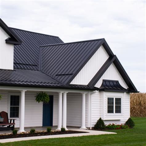 black metal roof white house|white house black roof pictures.